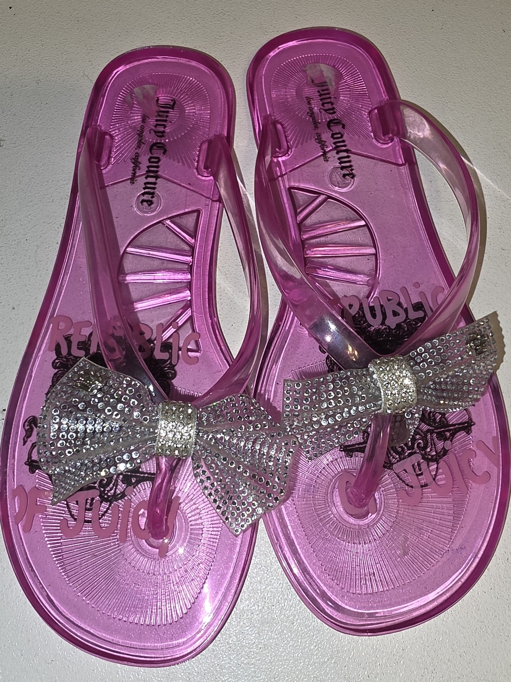 Juicy Couture Women's Pink Jelly Bow Flip Flops